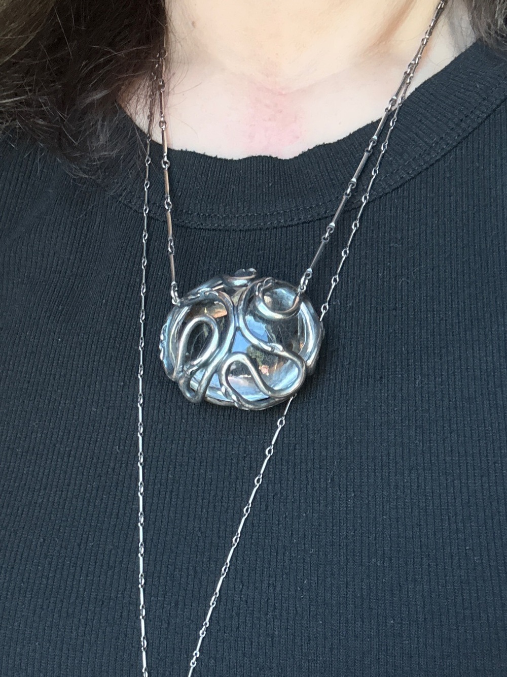Bloodmilk OOAK Golden rutile grief snake “egg” orb pendant.